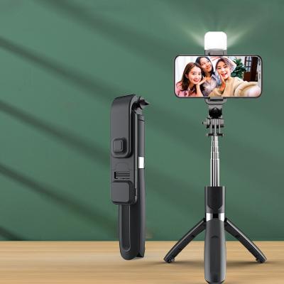 China New Product Mini Selfie Stick Remote Control Lengthened Tripod Mobile Phone Desktop Bracket To Fill Central Statistical Live Broadcast Bracket Beauty Light Lamp for sale