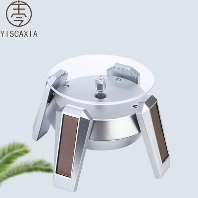 China ABS Yiscaxia Factory Supply 4 Leg Display Rack Direct Rotating Solar Rotating Display Stand for sale