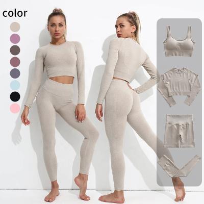 China Wholesale Breathable 4 Piece Ribbed Seamless Yoga Set Women's Wicking Breathable Tight Vest Sweat Moisture Fitness Sports Yoga Set for sale