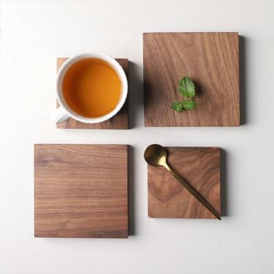 China Black Walnut Square Coasters Insulation Viable Insulation Square Wooden Pot Rack Plain Anti-Scalding Wooden Coaster for sale