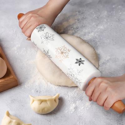 China Sustainable Customized Ceramic Pin With Wooden Handle Multi Purpose Rolling Pin Ceramic Kitchen Tools for sale