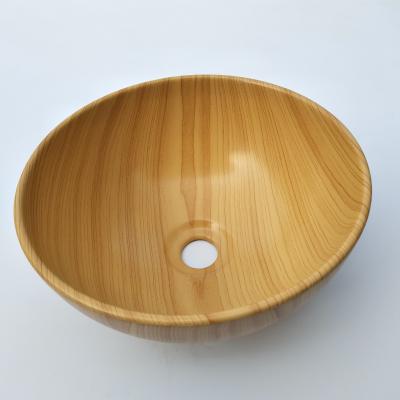 China Plastic Ceramic Lavatory Pattern Wash Basin Wooden Water Transfer Printing ABS Bathroom Hydraulic Dip Basin for sale