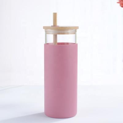 China 2021 Viable Wholesale Silicone Stand Portable Glass Water Bottle With Lid And Bamboo Straw for sale