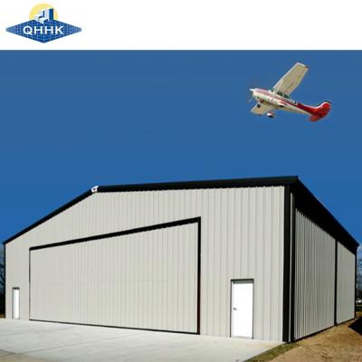 China Panel de sándwich Techo de pared Q355B Cuadro de almacenamiento Helicópteros de acero Hangar de aviones Edificios en venta