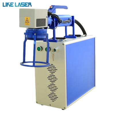 China High Speed 20W 30W 50W Handheld Laser Marking Machine for Tyre Mask Pattern Marking for sale