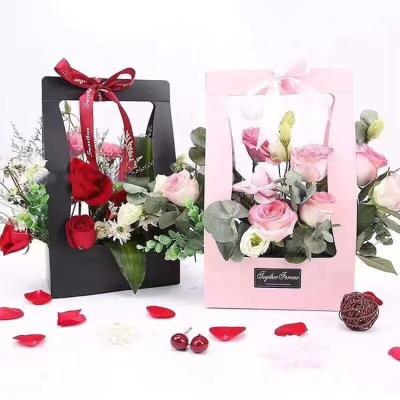 China Recycled Materials Custom Portable Flower Box With Handle Foldable Flower Box Packaging Design for sale