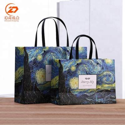 China Recyclable Luxury Custom Size Logo Paper Bag Spot And UV Printing for sale