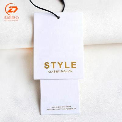 China Sustainable Custom Merchandise Hang Tags Wholesale Clothing Hang Tag for sale