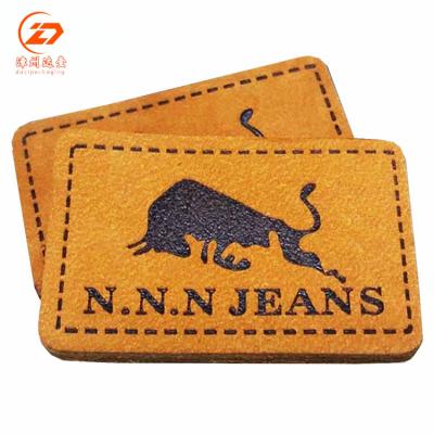 China Factory direct custom made genuine leather label jeans leather design viable for clothing for sale