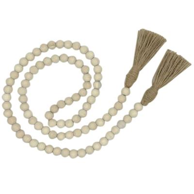 China Modern Home Decorations Wood Beads Design Garland Nordic Wood Beads Tassel Kids Room Tent Bed Hanging Ornaments for sale