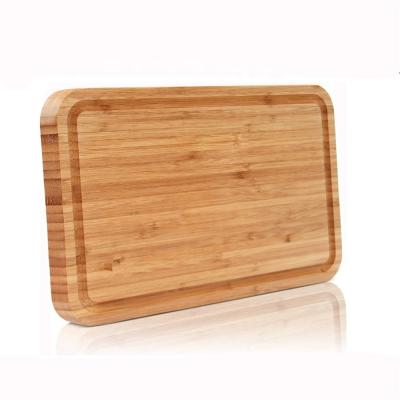 China Sustainable Solid Wooden Kitchen Tray Cutting Board Bamboo Kitchen Serving Wooden Tray for sale