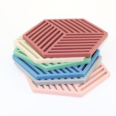 China Kitchen Table Place Mat Non Slip Pot Holder Pads Silicone Heat Resistant Stocked Heat Resistant Mat for sale