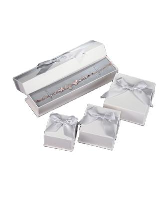 China 2020 Hot Sale Gift Cardboard Jewelry Boxes Ribbon Jewelry Gift Packaging Ring Box With Printed Logo for sale