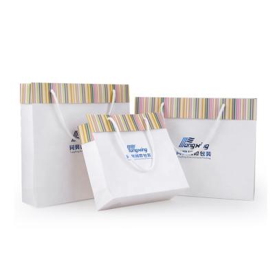 China Well- Recyclable Heavy Duty Paper Bag Printing Packaging Bag Luxury Paper With Custom Design Style Logo for sale