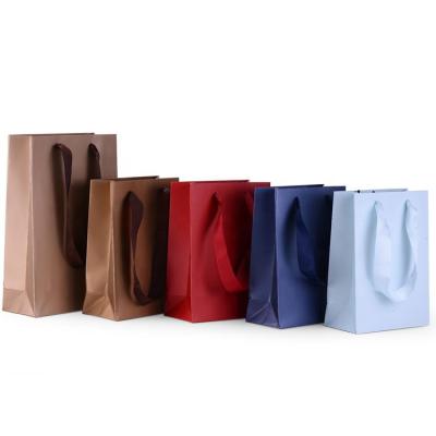 China Factory Supply Handmade Cheap Custom Printed Shopping Paper Bags for sale