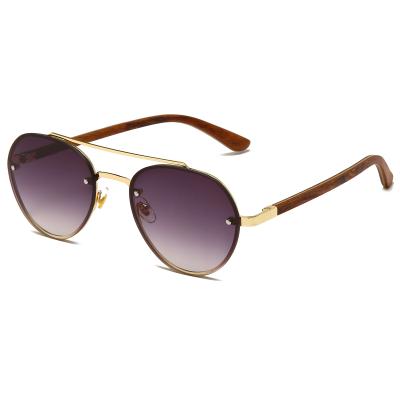 China Fashion Sunglasses 2021 Fashion Metal Frame OEM Wooden Temples Sunglasses With Spring Hinges for sale