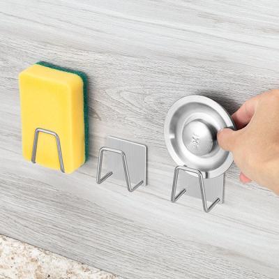 China New Design Sustainable Special Sponge Trolley Sink Shelf Self Adhesive Stainless Steel Sink Organizer Kitchen Sponge Holder for sale