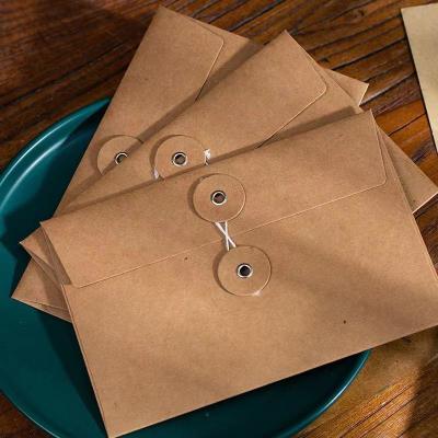 China Romantic Envelopes Paper Products Logo Printing Mini Brown Kraft Paper Twine And Button Jewelry Necklace Custom Gift Packaging Envelope for sale