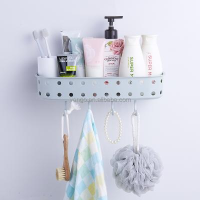 China Sustainable Home Plastic Stable Sticker Bathroom Shelf Storage Hanging Rack Holder With Hook for sale