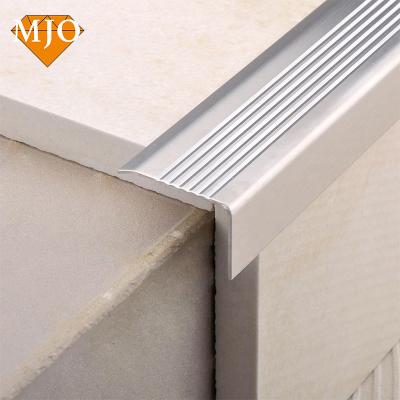 China Foshan Manufacturer MJO Modern Hot Sale Stainless Steel Flair Strips For Stairs Decoration OEM Logo Porcelain Tile Stair Nosing for sale