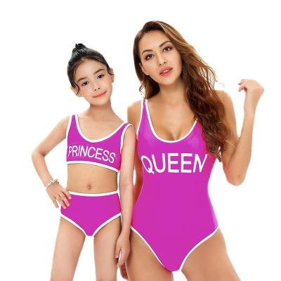 China QUICK DRY sexy mommy and me letter print hot pink bikini swimwear women monokini family matching swimwear for mother daughter for sale