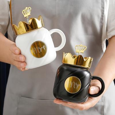 China Viable Creative Modern Ceramic Crown Matte Black And White Mug With Lid Spoon Couples Gift Cup Can Be Printed With Logo for sale