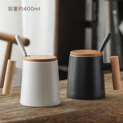 China Viable Custom Logo Couple Style Ceramic Mug Wood Handle,Promotional Gift 450ML Ceramic Coffee Cup With Cover Bamboo Spoon for sale