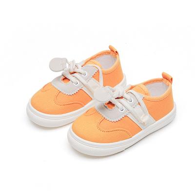 China New solid color canvas spring boys' school leisure shoes indoor girls' lightweight children's shoes 2023 one pedal board shoes for sale