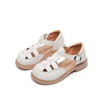 China Children's sandals hollowed out light Roman girls solid color shoes 2023 summer new style boys beach shoes for sale