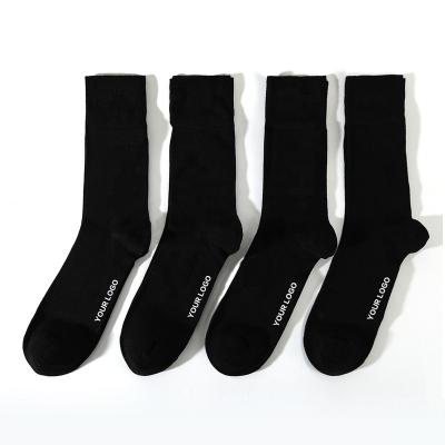 China Sustainable factory best quality custom bamboo fiber knitted plain solid black color crew socks for unisex in all season for sale