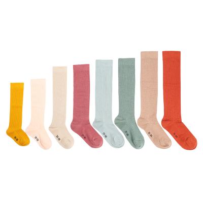 China Breathable Cute Funny Custom Organic Cotton Knee High Non Slip Candy Color Logo Newborn Baby Socks For Four Seasons for sale