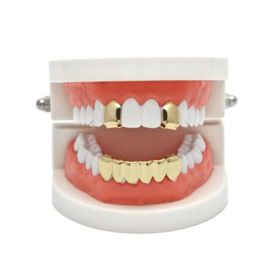 China Halloween Holiday Multi Colors Body Silicone Hip Hop Grillz Environmental Friendly Hot Selling Brass Teeth for sale