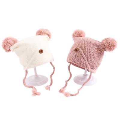 China Wool and wool plush ball autumn new and simple knitted wool hat winter thickened warm baby knit hats for sale