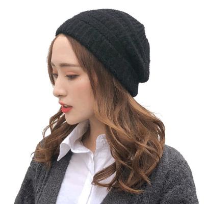 China Woolen Baotou Hat COMMON Hearing Protection Exposed Ponytail Hat Top Empty Knitted Wool Hat for sale