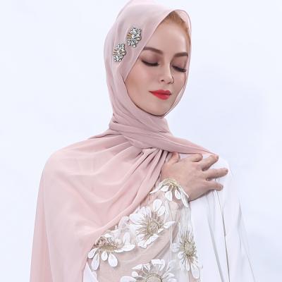 China Competitive Price New Fashionable Pearl Rhinestones Hijabs Flowers Long Chiffon Head Scarf for sale