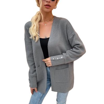 China Anti-wrinkle winter high street button sleeve solid color fine knitted women long open cardigan with pocket for sale