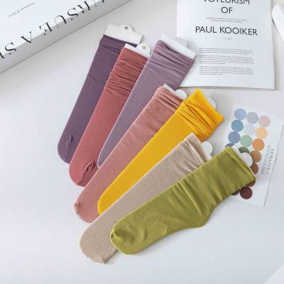 China Viable Small S Tube Fresh Cream Custom Bangs Logo Morandi Color Women&'s Bangs Solid Light Color With Velvet Womens Socks for sale