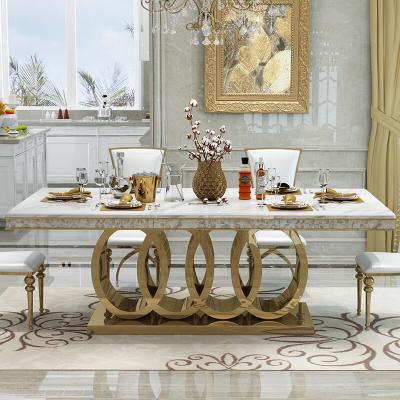 China Adjustable luxury home hotel marble top (others) and stainless steel gold dining table and chair set base furniture for sale