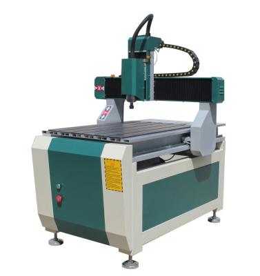 China Garment Shops 6090 Plywood Small Size Advertising Wood MDF Engraving Cutting CNC Router Machine for sale