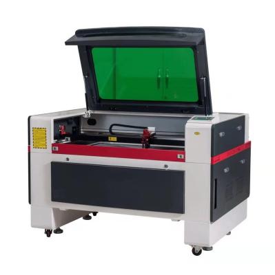 China Laser Engraving Price CNC CO2 Cutting Machine And Laser Cut Glass Engraving Machine for sale