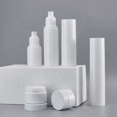 China Cosmetic Bottle Airless Spray Lotion Cosmetic Bottle In White With White PET Jars for sale