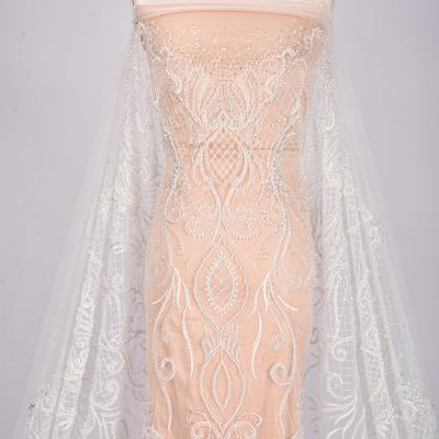 China Other Elegant White Shiny Wedding Sparkly Lace Embroidery Beading Beaded Dress Net Lace Bridal Net Lace Fabric for sale