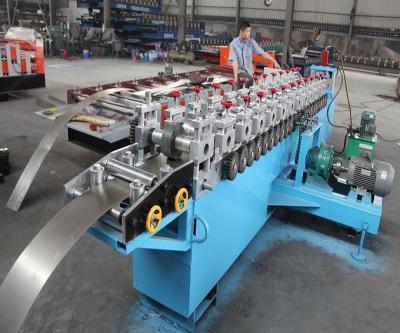 China Building Material Shops Garage Roller Shutter Door Roll Forming Machine for sale