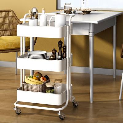 China Carbon Steel Storage Cart Island Kitchen Vegetables Cart Microwave Storage Rack With Wheels for sale