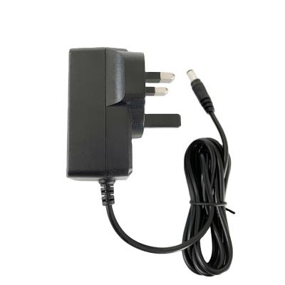 China Certified UK Plug 12V 2A 24W 12v 2amp AC DC Power Adapter Supply Adapter For CCTV Camera ZL-024WL for sale