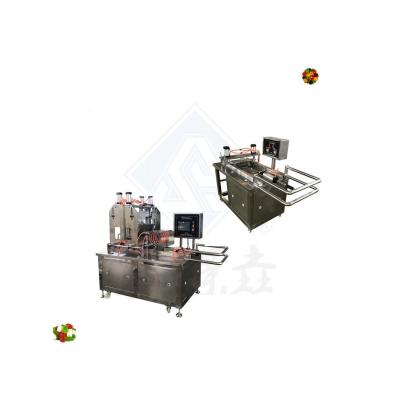 China Assorted Double Colors Soft Jelly Candy Making Machine Gummy Candy Depositing Machine for sale