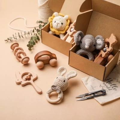 China New Disposable Baby Gift Set 4pcs Crochet Rattle Baby Shower Animal Gift Boxed Wooden Toy Set for sale