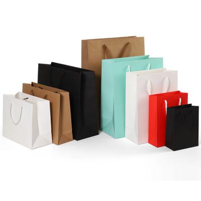 China Custom Design Recyclable Luxury Colorful Print Your Own Logo Hand Kraft Paper Shopping Bag Clothes Party Shoes Gift for sale