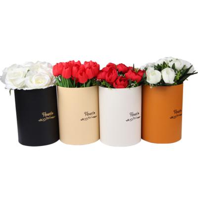 China Custom Materials Different Shape Recycled Corrugated Cardboard Wholesale Flower Round Packaging Box for sale