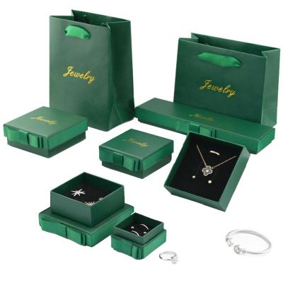 China Organizer Pu And Velvet Emerald Leather Jewelry Boxes For Ring Necklace Portable Jewelery Ring Box Packaging Dark Green for sale